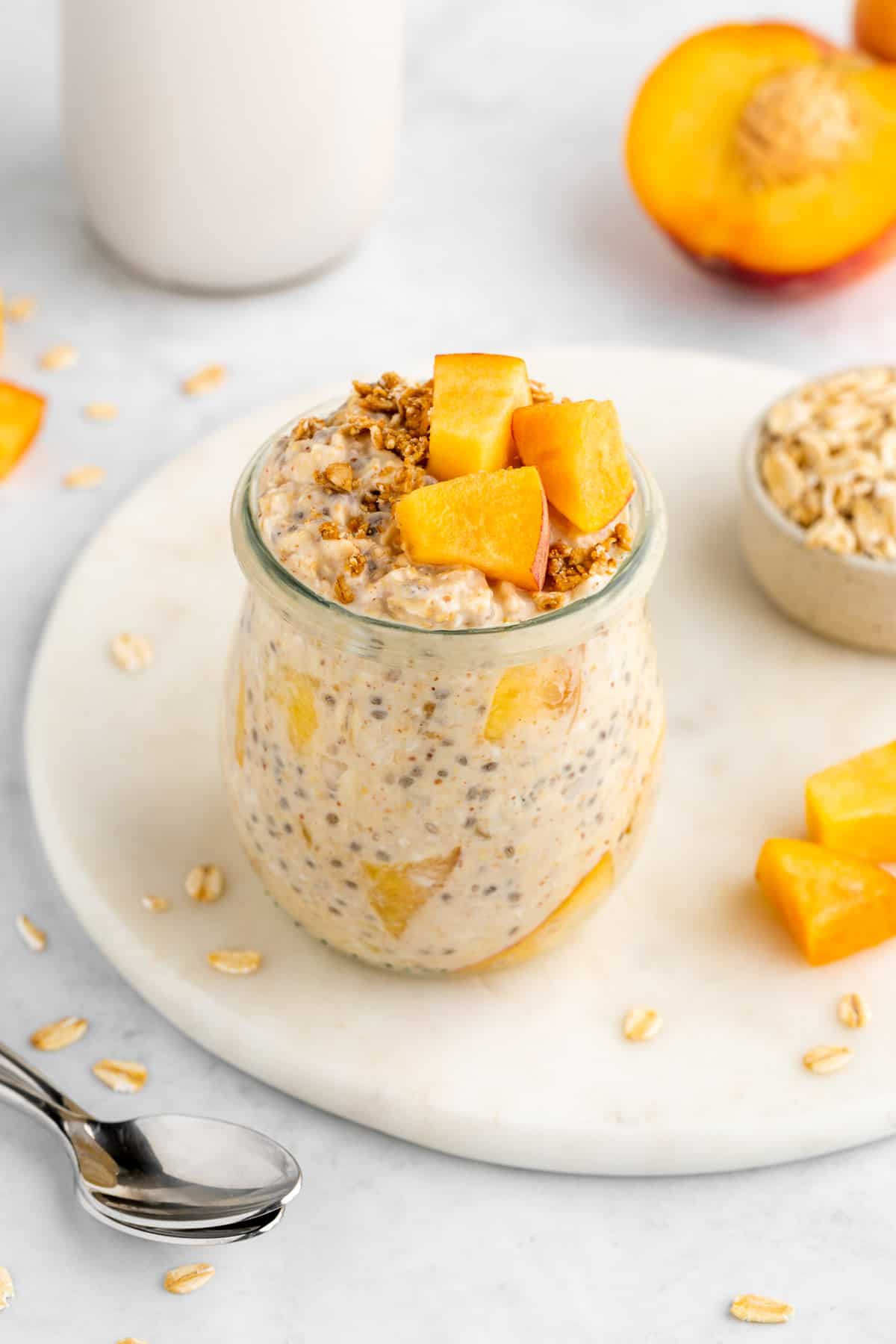 https://www.purelykaylie.com/wp-content/uploads/2023/01/peaches-and-cream-overnight-oats-4.jpg